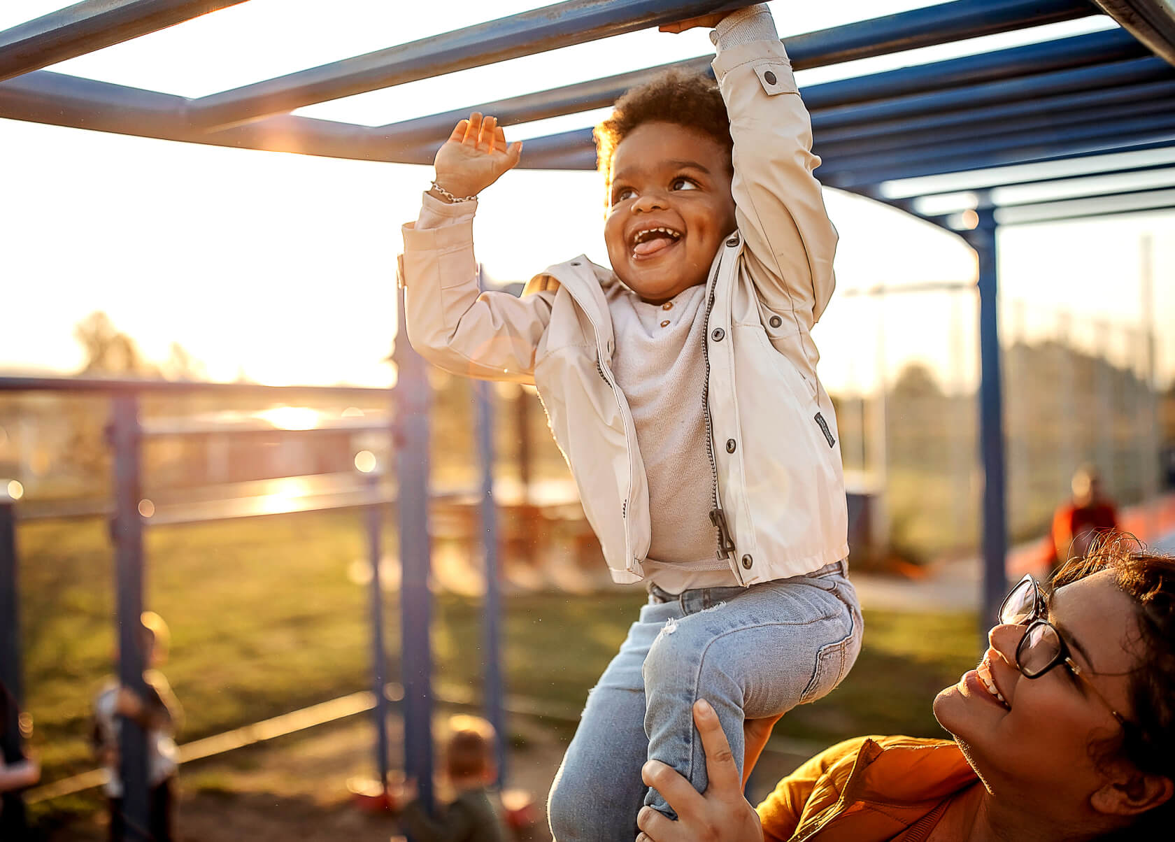 Young child playing on play ground