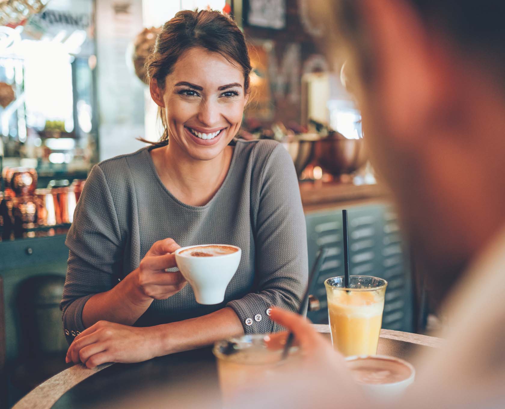 Young woman enjoying a coffee