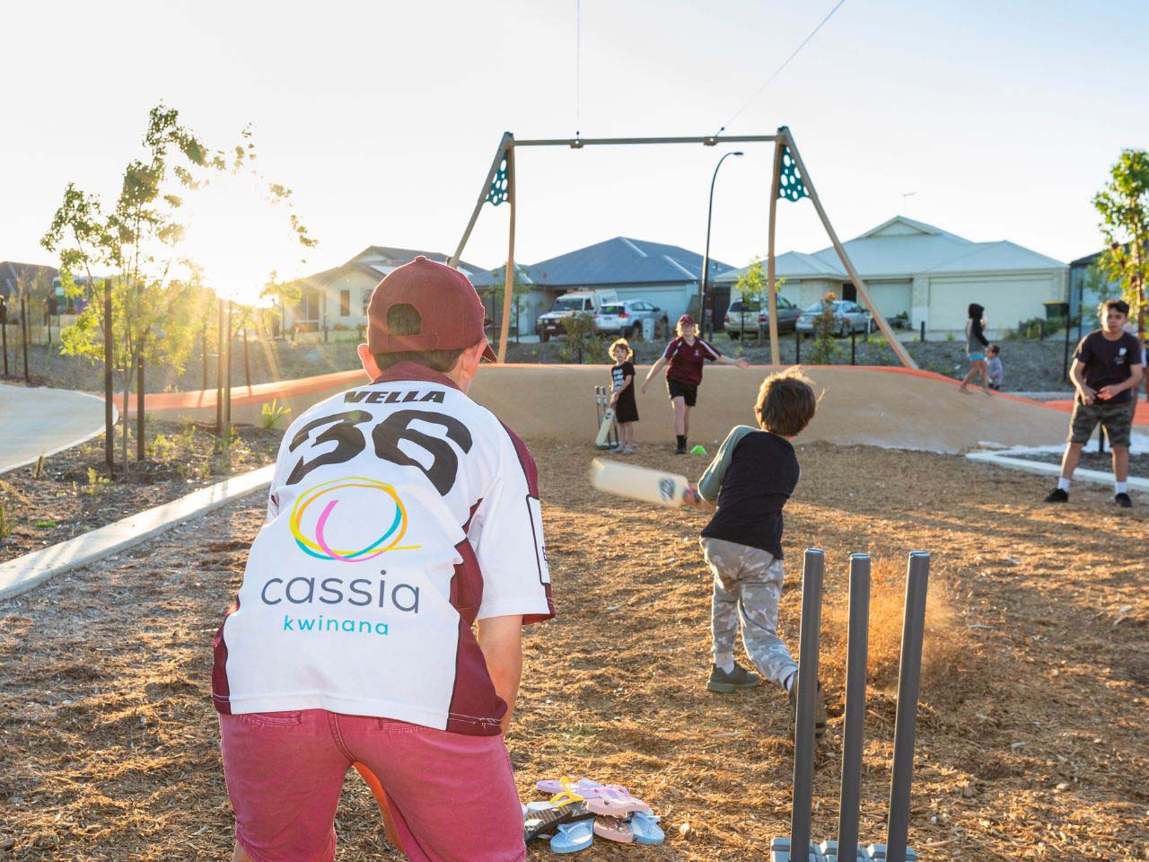Cassia, Kwinana young children playing cricket in the park