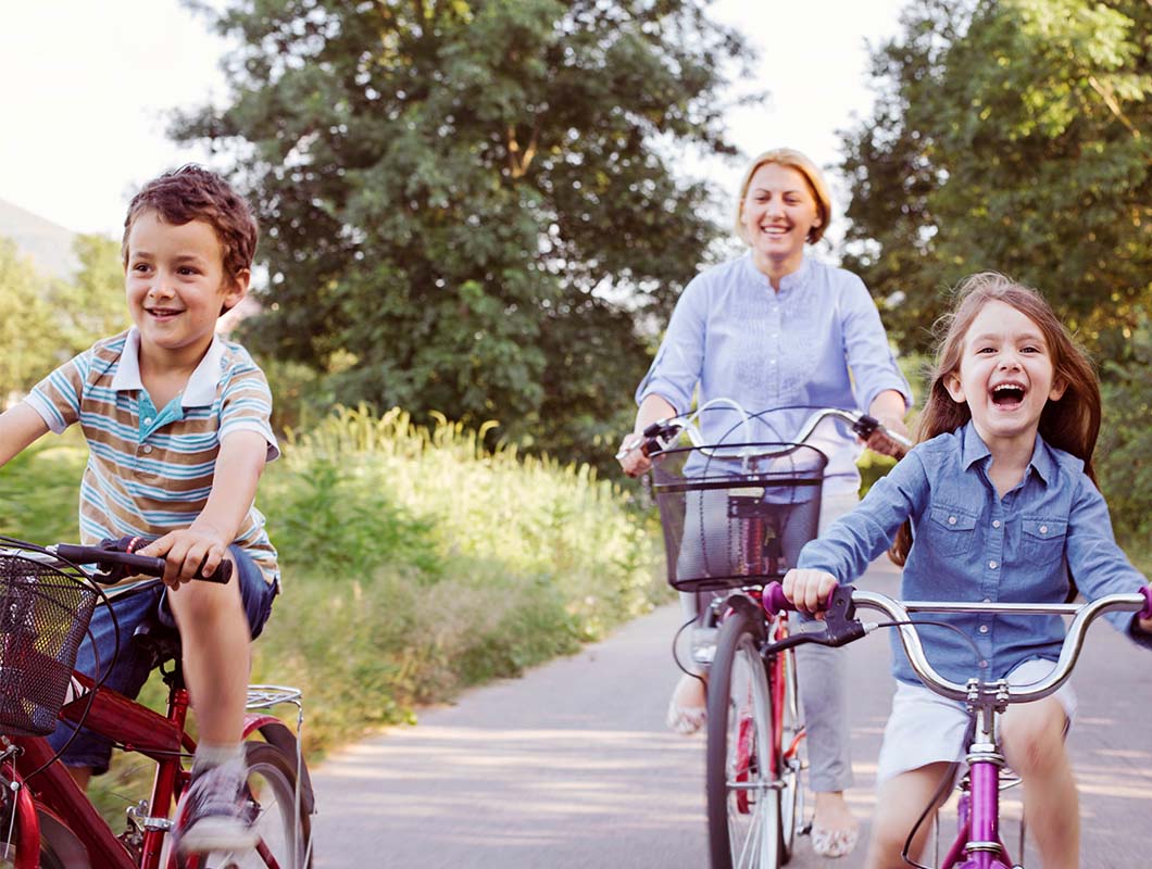 Seven Hills mother riding bike with her two children