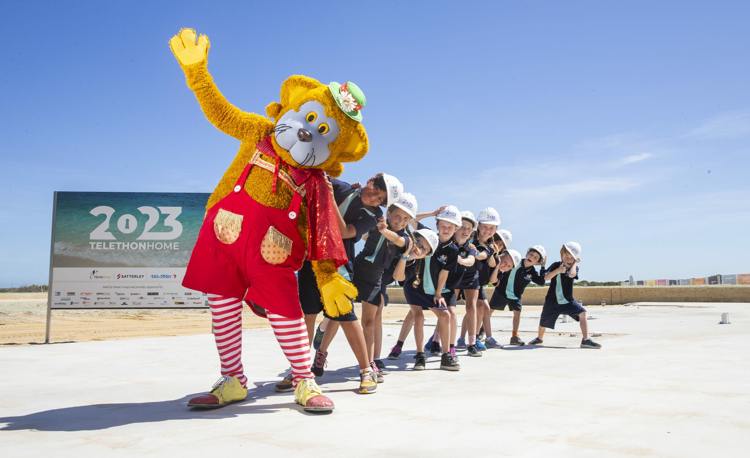 Telethon Home slab with Fat Cat and children from Madora Bay Primary School