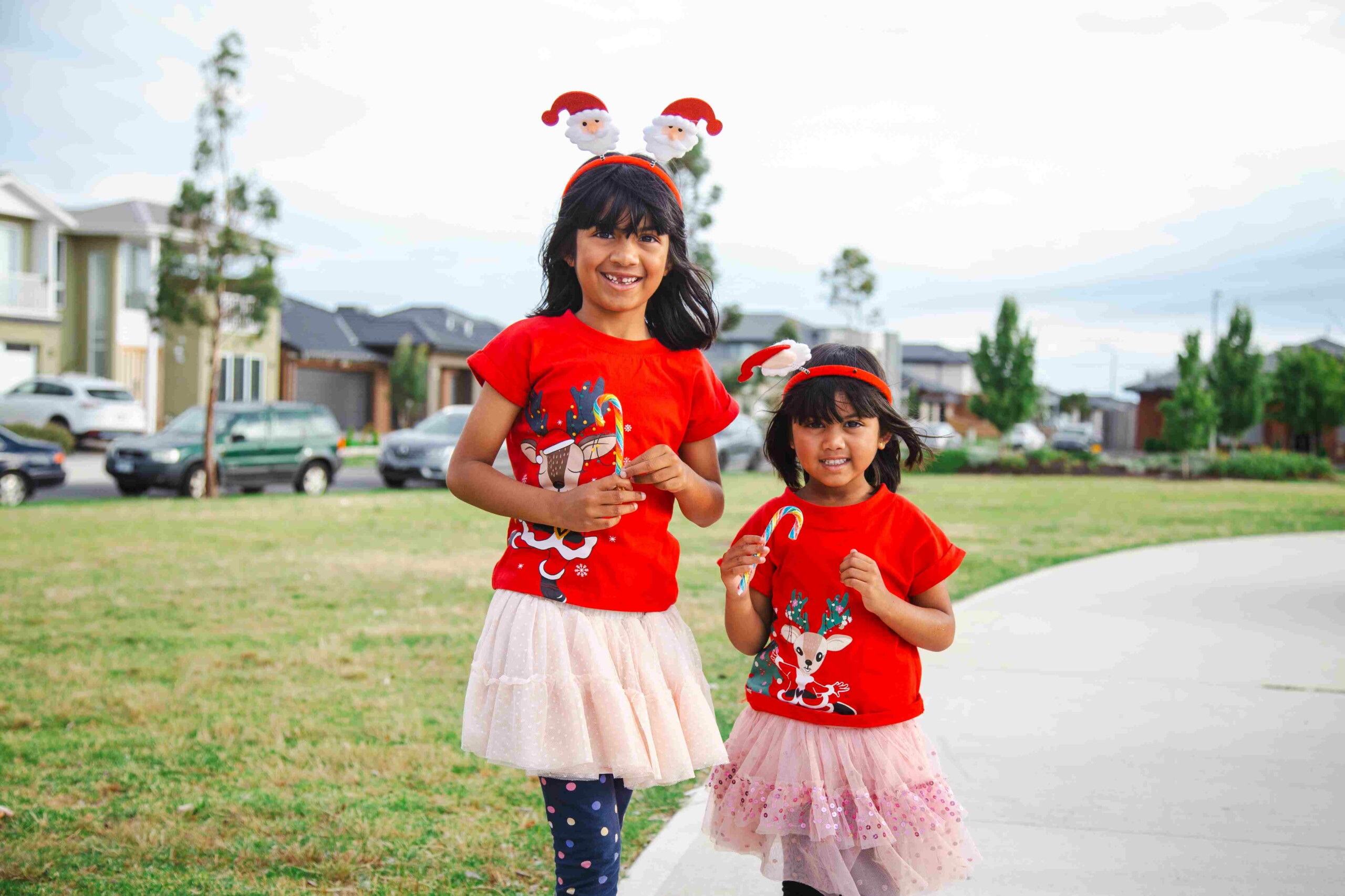 Arcadia Christmas movie night young children with candy canes